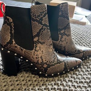 Charles David snakeskin print booties.